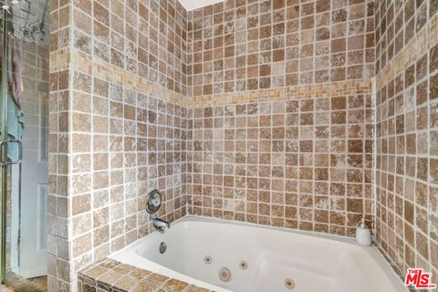 Tiny photo for 4610 Densmore Avenue #105, Encino, CA 91436 (MLS # 25602011)