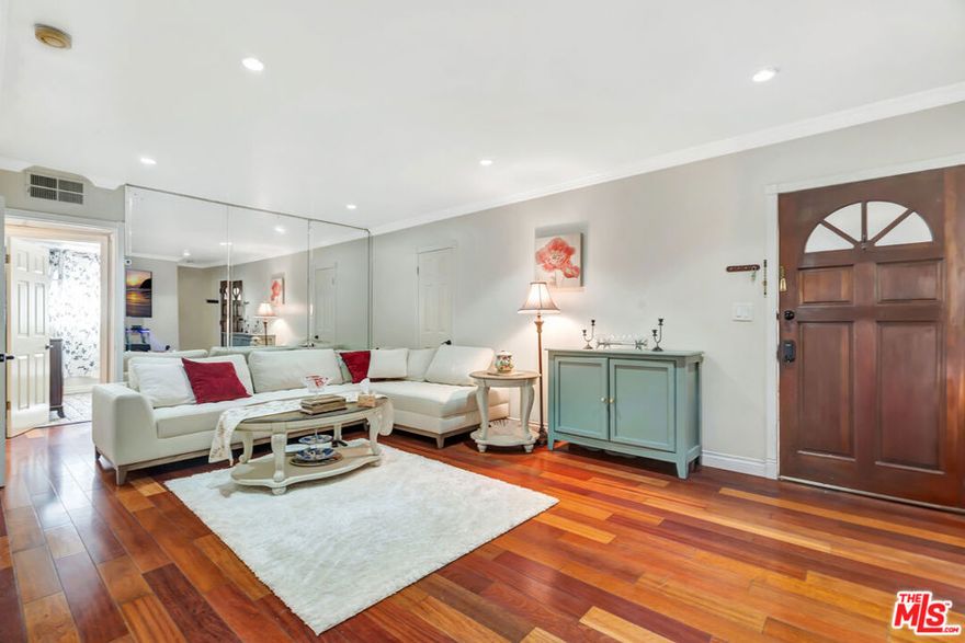 This gorgeous condo, located South of the Boulevard in one of Encino's most sought-after neighborhoods, is a beautifully maintained 2-bedroom, 2-bathroom condo that offers 920 sq ft of well-designed living space in a prime, walkable location. The light-filled unit features an open floor plan, spacious living and dining areas, and the convenience of in-unit laundry. The well-appointed kitchen offers ample cabinetry and counter space, ideal for both everyday living and entertaining. Both bedrooms are generously sized, including a primary suite with an en-suite bath. Enjoy resort-style amenities within the gated community, including a sparkling pool, BBQ area, and a clubhouse for gatherings. Just moments from Ventura Blvd's premier restaurants, shopping, and entertainment, with easy access to freeways and transit. It is conveniently close to Hesby Oaks School, which is highly rated with a score of 9 to 10. A rare opportunity to own in an unbeatable Encino location!