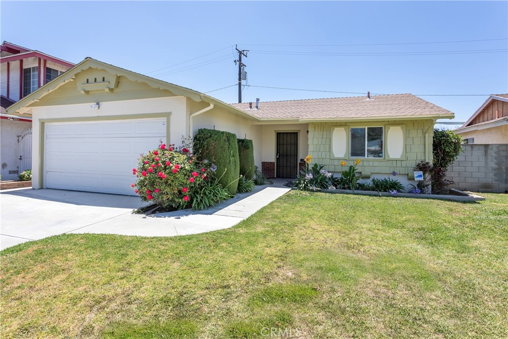 Welcome to 1448 E Fernrock Street – a fresh, modernized retreat tucked into one of Carson’s most established and vibrant neighborhoods. From the curb, a manicured lawn, colorful blooms, and character-rich trim create a warm first impression. Step inside, and you’re greeted by an airy open concept living space that instantly feels like home. Crisp white walls, recessed lighting, luxury vinyl plank flooring, & new central AC set the stage for easy everyday living with just the right amount of contemporary polish. The heart of the home is the newly upgraded kitchen — featuring gleaming countertops, fresh white shaker cabinets, and stainless-steel appliances. Grab a coffee and pull up a stool, or flow into the adjacent dining area with sliders that open to the backyard — perfect for seamless indoor-outdoor living. A fully permitted 402 SQFT addition transforms this classic home into a true 3-bedroom, 2-bath layout — now totaling 1,442 SQFT. The new primary suite is tucked at the rear for privacy and offers generous space, designer finishes, and a tranquil en-suite bath. Two additional bedrooms are bathed in natural light, with ample closet space and a clean, updated hall bath nearby — ideal for guests, family, or a dreamy home office. Outside, the backyard offers a blank canvas to create your own private oasis. Whether it’s weekend BBQs, a play space, or a peaceful garden, the space is ready for your vision. And don’t miss the aerial perspective — this quiet street is nestled in a well-kept pocket of Carson, offering proximity to shopping, parks, and freeway access without sacrificing that true neighborhood feel.
1448 E Fernrock is the one — the space, the updates, and the vibe you’ve been waiting for.