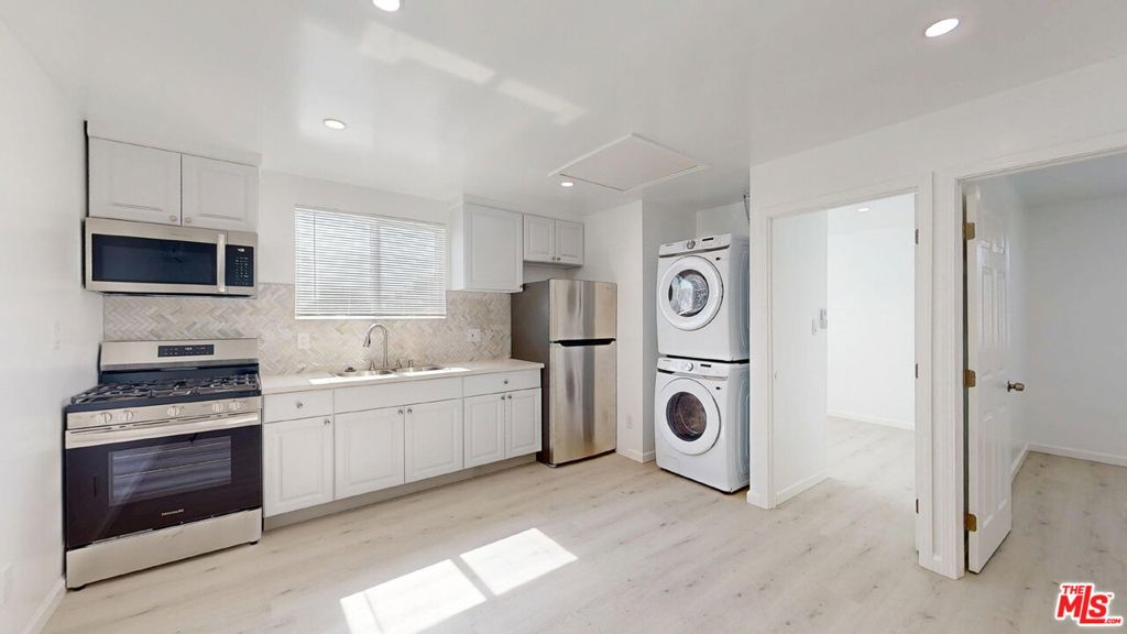 Located at 10550 Collett Avenue in the heart of Granada Hills, this cozy second-floor ADU offers convenience and comfort. Just minutes from the 118 and 405 freeways, you'll enjoy quick access to the San Fernando Valley and surrounding areas. Nearby Granada Hills Charter High School, Petit Park, the Granada Hills Recreation Center, and a variety of shops and dining options along Chatsworth Street!FEATURES: 2 bedrooms + 1 bathroom. Approx. 640 sq ft of living space. Second-floor ADU, private and quiet. Kitchenette with Granite kitchen countertops and appliances including Gas stove, Microwave, Refrigerator. Garbage disposal. Hardwood floors throughout. Recessed lighting for a modern touch. Air conditioning for year-round comfort. In-unit laundry: washer and dryer included. Ample storage with cabinets and shelving. Window blinds installed. BBQ area available. Gardening included. Cats are accepted (subject to approval). RENTAL TERMS: Application Fee: $60 per adult.- Security Deposit: One month's rent on approved credit. However, there are certain exceptions for small landlords who own just two properties, provided that the total rental units between these properties does not exceed four. Landlords who qualify as small property owners may charge up to two months' rent.- Lease Term: 12 months- Renters' insurance is required.- Cats are allowed (subject to approval). Monthly Pet Support Fee of $75- $125 (depending on PetScreening rating).- Parking: Street Parking.