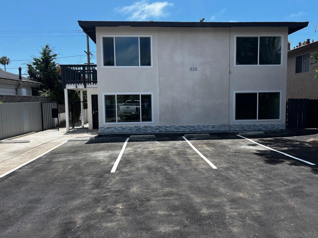 massively remodeled. almost everything redone. huge $$$ must have been spent. all permitted. a detached house and 4 units. all presently vacant - perfect to rent at top dollar, or airbnb? or group/medical home? Gated. tons of parking. yards. excellent residential neighborhood with mostly expensive SFRs around. laundry room and one unit has laundry inside. on Realtor lock box.