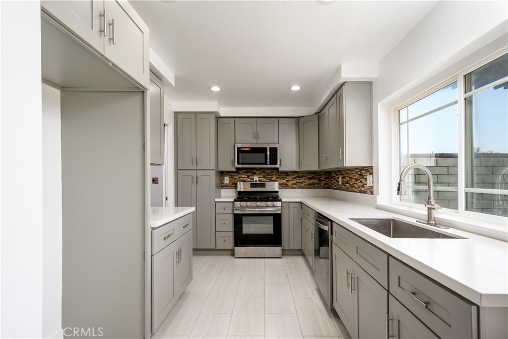 Welcome to this beautifully updated 3-bedroom, 2.5-bath single-family attached home in the highly sought-after Cypress Village community. Move-in ready, Step inside to find a bright and inviting layout, featuring laminate flooring, a modern kitchen appointed with quartz countertops, stainless steel appliances, and an adjacent indoor laundry room. Updated half bathroom is located downstairs for added convenience. Upstairs, The primary bedroom is generously sized. Located in a beautifully maintained neighborhood with top-rated schools, scenic parks, and walking trails, this home offers an incredible opportunity to enjoy one of the area’s most desirable communities. No carpets all Laminate and Tile flooring. Welcome home!