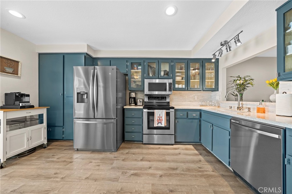 Welcome to this highly upgraded townhome with no one above or below, combining modern updates with a fantastic location in South Orange County.
Step inside to discover an open and airy layout featuring vinyl flooring throughout, abundant natural light, and a remodeled kitchen with high-end appliances. The main level also includes a stylish half bath, a spacious closet, and room for a full dining table. From the living area, a sliding glass door opens to your own private patio with seating and BBQ area—perfect for entertaining friends and family. Enjoy year-round comfort with double-pane, energy-efficient windows and sliding door, keeping the home cozy whether you run the AC or heat.
Upstairs, you’ll find two generously sized bedrooms, thoughtfully placed on opposite sides of the home for privacy, each offering ample closet space. A beautifully upgraded full bathroom and a convenient laundry area complete the second level.
This home also comes with two assigned parking spots, plus water and trash service included in the rent. Just steps from your front door, enjoy resort-style amenities including a sparkling pool and spa, a clubhouse, and a play area where kids can ride bikes and play outdoors.
The community is surrounded by parks, hiking trails, and top-rated schools, while everyday conveniences like Stater Brothers and Dollar Tree are within walking distance. For commuters, the location can’t be beat—only 15 minutes to Irvine Spectrum, 20 minutes to John Wayne Airport, and 15 minutes to the stunning beaches of South Orange County.
Don’t miss this opportunity to lease a beautifully upgraded home in one of the safest and most desirable areas of OC!