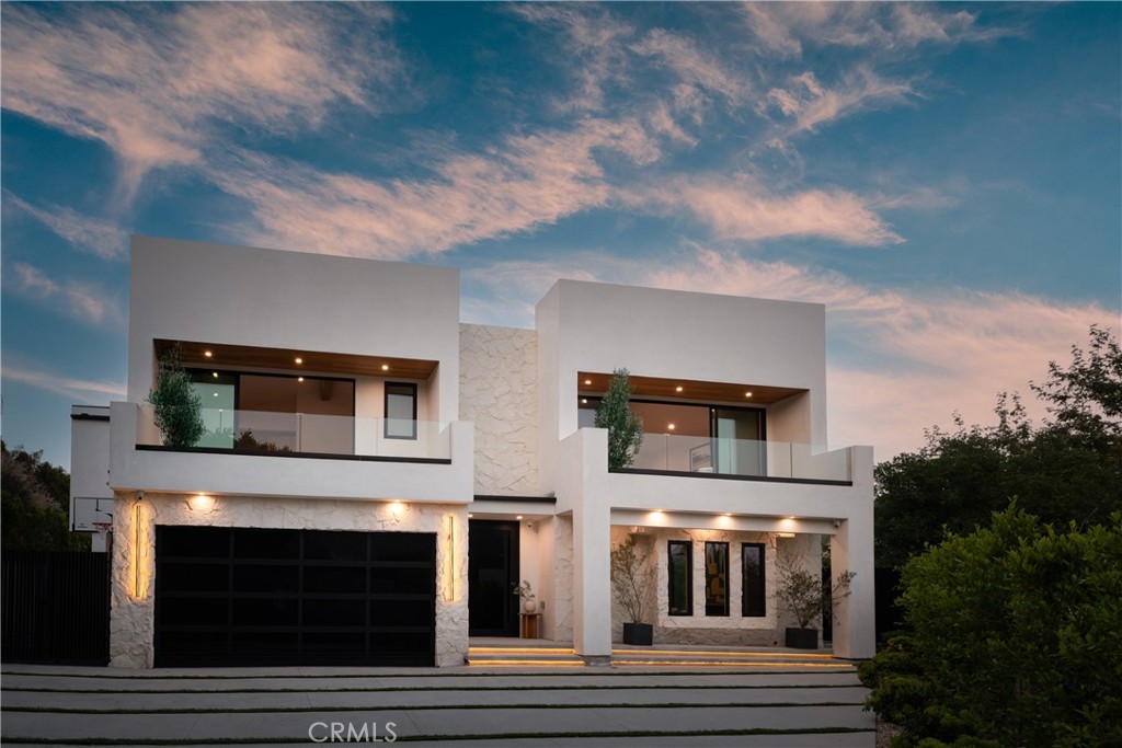 Luxurious modern oasis completely re-built nestled within an exclusive Nichols Canyon location and featuring explosive views. Situated down a long driveway providing utmost privacy and with a driveway large enough to accommodate 5+ cars. Impressive open floor plan and floor to ceiling glass doors allow for ample natural light to flood the home. Custom chef's kitchen displaying Thermador appliances, Taj Mahal countertops and spacious walk in pantry.
Backyard is a true paradise with an infinity pool/spa looking out to explosive views , BBQ center, built-in Fire pit seating, fully covered patio and abundance of grass great for entertaining. Luxurious primary suite with vaulted ceilings, fireplace, oversized dual walk-in closet space and balcony looking out to the views. Spa-like bathroom boasting a walk-in shower, soaking tub and makeup vanity. This modern estate perfectly blends the indoor/outdoor lifestyle with modern comfort and the top notch amenities. Just minutes from the Sunset strip and LA's best restaurants, shops and nightlife.