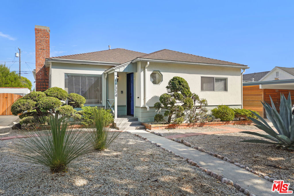 Welcome to the charming Sunset Park neighborhood in Santa Monica! Thoughtfully updated and boasting a prime location, this home offers the best of Southern California living. The kitchen has recently been transformed into a more modern and functional space with new custom cabinets & quartz countertops so you'll have ample storage and a beautiful surface for meal preparation. The stainless steel appliance package, which includes a range/oven, exhaust hood, refrigerator, and dishwasher, adds a sleek and cohesive look to the kitchen while providing reliable and efficient functionality. The single-tub sink and a one-piece faucet with a retractable sprayer enhances the convenience and ease of use when washing dishes or preparing food. Other recent home improvements include the above-mentioned kitchen, two beautifully remodeled bathrooms, refinished hardwood floors, hardwood laminate & tile floors, ceiling fans, and fresh paint throughout. This home also includes formal living & dining rooms to host your guests and a large family room for those lazy days spent relaxing at home. Enjoy the incredible ocean breezes and indulge in the ultimate outdoor living experience with your covered patio and private Zen backyard, complete with ample storage for your bicycles, beach gear, home gardening equipment, and extra belongings. The 2-car garage offers an incredible workbench and even more storage for all of your special DIY projects while still providing room to park one car. The attached carport and driveway allow for additional parking, accommodating at least five other vehicles. Located just half a block from Will Rogers Elementary School and a mere two blocks from John Adams Middle School, convenience and accessibility are at your fingertips. Additionally, this home is only 13 blocks from the Pacific Ocean and just minutes away from some of the area's top attractions including the Santa Monica Pier, Santa Monica College, Santa Monica Swim Center, Clover Park, Penmar Golf Course, & SaMo High School. Enjoy close proximity to the cafes, restaurants, and services on Ocean Park Blvd. and nearby access to the Expo Line, 10 Fwy., and Venice Beach. Don't miss your chance to call this quintessential Santa Monica home your own!