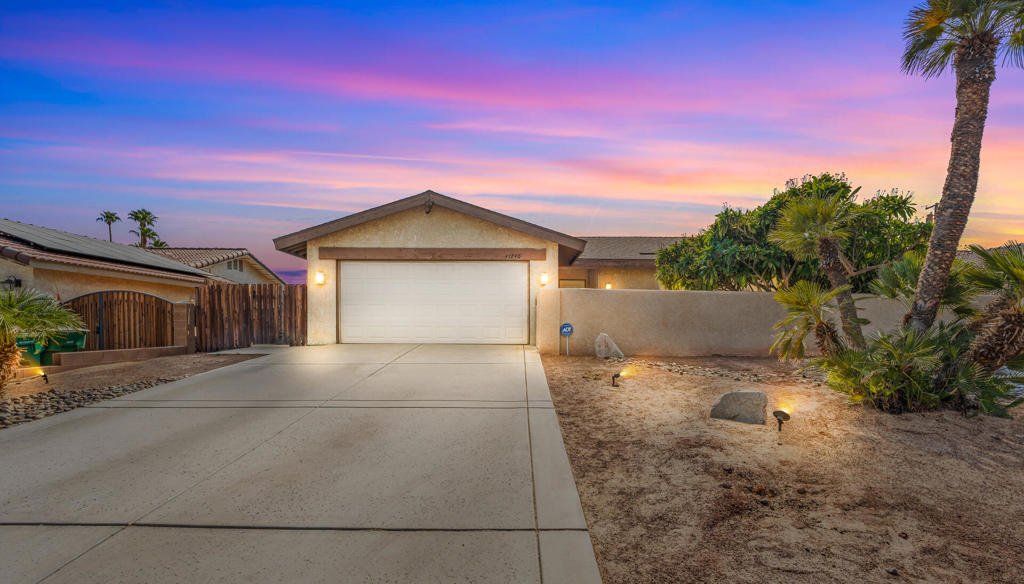 Welcome to this beautifully updated 3-bedroom, 2-bath home, perfectly situated in a desirable neighborhood with no HOA and Fee Simple land--you own it! From the moment you arrive, you'll love the inviting curb appeal with a refreshed front courtyard and low-maintenance desert landscaping.Step inside to discover a bright and airy floor plan featuring vaulted ceilings, fresh paint, new flooring, stylishly renovated bathrooms, and upgraded lighting throughout. The remodeled kitchen is a true highlight, showcasing modern cabinetry, sleek countertops, stainless steel appliances, and upgraded fixtures--ideal for everyday living and entertaining.The spacious living room offers a cozy fireplace and dual sliding glass doors that open to a covered patio, seamlessly blending indoor and outdoor living. The primary suite includes French doors to the backyard and a generous walk-in closet.Set on a large lot, the home features a pet-friendly backyard with endless potential--perfect for adding a pool, spa, or BBQ area. Fenced and gated side yards provide extra room for storage, equipment, or off-road toys.Tucked away on a quiet street, yet just minutes from shopping, dining, and conveniences. Plus, enjoy the savings of low IID power rates. This home truly has it all--don't miss your chance to make it yours! Schedule your private showing today.