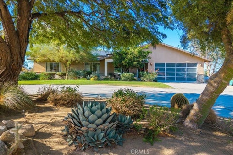 Photo of 61676 Pueblo Trail, Joshua Tree, CA 92252 (MLS # JT26193499)