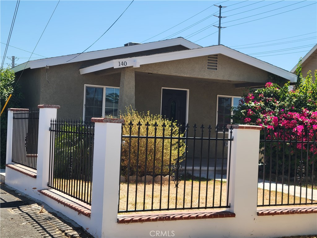 Charming 4 BR 1.5 BA Home on 4,000 sqft lot in the heart of Colton. This home has been beautifully remodeled & is perfect blend of modern finishes & endless potential . New waterproof, laminate flooring throughout. New tile & fixtures in bathrooms and kitchen. Kitchen has brand new custom kitchen cabinets, new quartz stone counters, new garbage disposal, new pull out faucet, New custom bathroom w/ bathtub and shower w/ beautiful mosaic tile walls w/ elegant tile design, new vanities, new toilets. All new plumbing fixtures. New light fixtures, New recessed lighting. Fresh paint inside and out. Central AC, Laundry inside. Front porch and private front & back yard. Large lot w/ large storage shed in back, room to build ADU. No Garage, Gated RV Access. Close to freeways, shopping, restaurants & schools. Perfect FHA home Must See