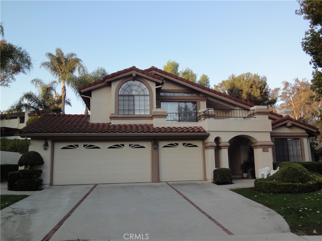 It's a Prime Location! Prestigious Estate home in the exclusive gated community of "Mountain Meadows" in North Pomona. This Community offers secure gated living w/mature trees, good for morning/sunset strolling, Easy Freeway access, convenience to Mountain Meadows Golf Course, and Frank Bonelli RV Park, and to the famous LA County Fairplex Fairgrounds, enjoy July 4th fireworks and snow-capped mountain view (in Winter) from the Primary balcony. Great floor plan with Total 4 Bedroom (one bed and one bath downstairs), 3 car attached garage. A tranquil tropical setting in the backyard w/covered patio & various palm trees. Wood shutters. Newer carpet. This stunning home features a large formal living room and a formal dining room, creating an ideal space for entertaining guests. The open floor plan is filled with natural lights throughout. All bedrooms are generously sized, The Primary suite also features an en-suite large bathroom, providing a private retreat for relaxation. Photos taken couple years ago for showing purpose.