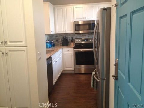 Photo of 20191 Cape Coral Lane #3-205, Huntington Beach, CA 92646 (MLS # OC26059422)