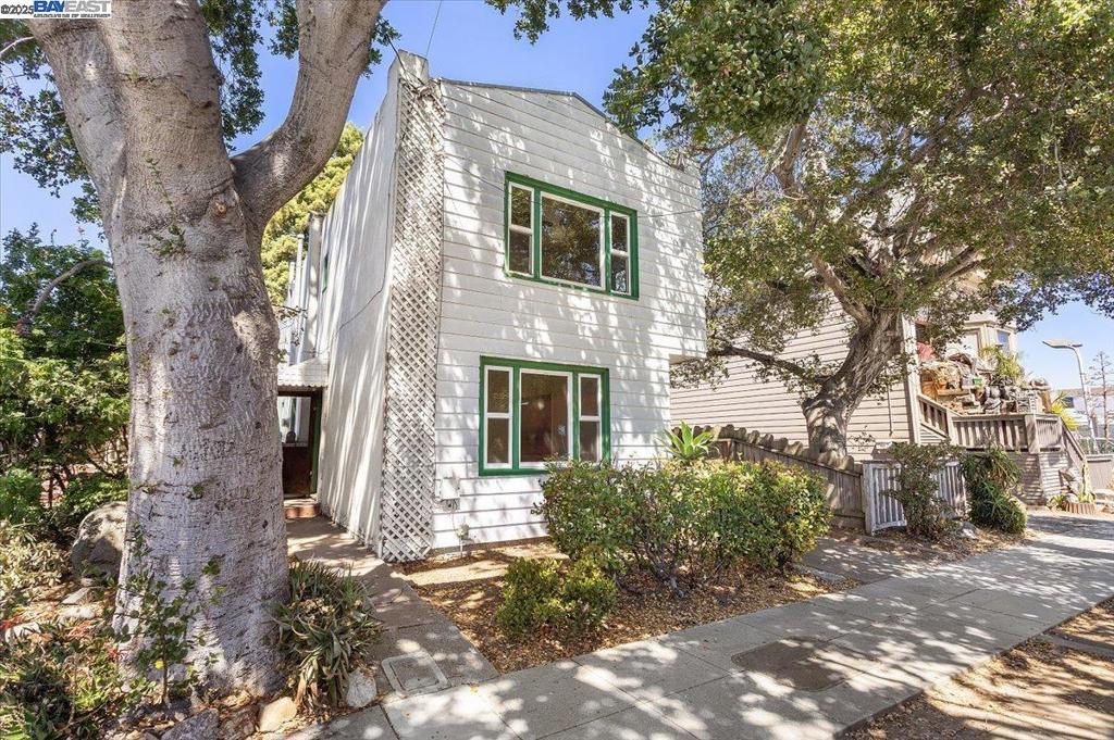 Could be easily converted back to 3 bedroom, 2 bath home with bonus room by eliminating 2nd kitchen upstairs. Fully vacant duplex opportunity 1+ blocks from Downtown Alameda’s bustling Park St. commercial district. Two one-bedroom, one-bath flats sit next to detached garage and off-street tandem parking for smaller vehicles in driveway. Large backyard features a towering redwood and lots of space for further improvements. Bring your vision and tool belt because with some investment, this duplex could become a solid income-earner or could be restored back to a single family home again. Pre-escrow with First American Title.
