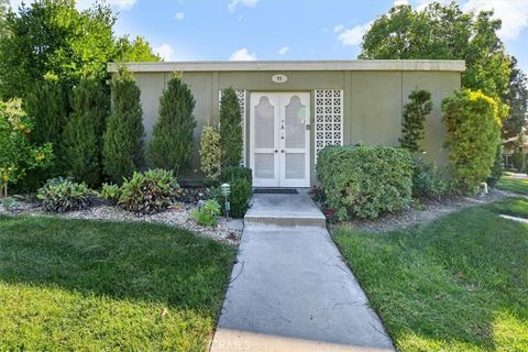 Photo of 11 Avenida Castilla #A, Laguna Woods, CA 92637 (MLS # OC26073079)