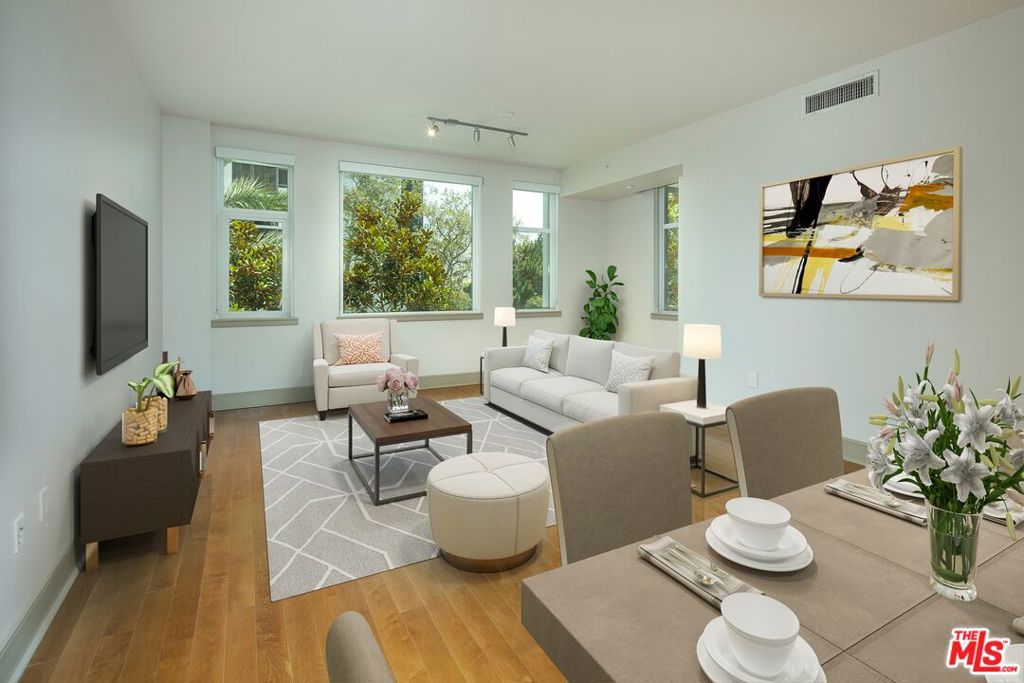 Experience refined living at Wilshire Victoria, recipient of the 2023 Best of Westwood Award for Apartment Complexes. This 1-bedroom + den, 1.75-bath residence offers 1,383 sq. ft. of open living space with east-facing views. Highlights include an in-unit laundry room and EV parking availability, plus premier amenities: 24-hour concierge service. Resident lounge. State-of-the-art fitness center.Executive conference room.Rooftop lounge with breathtaking city & mountain vistas. Blending timeless elegance with modern convenience, Wilshire Victoria offers an unparalleled lifestyle in the heart of the prestigious Wilshire Corridor. Furnished option available. Your journey to upscale living begins here.