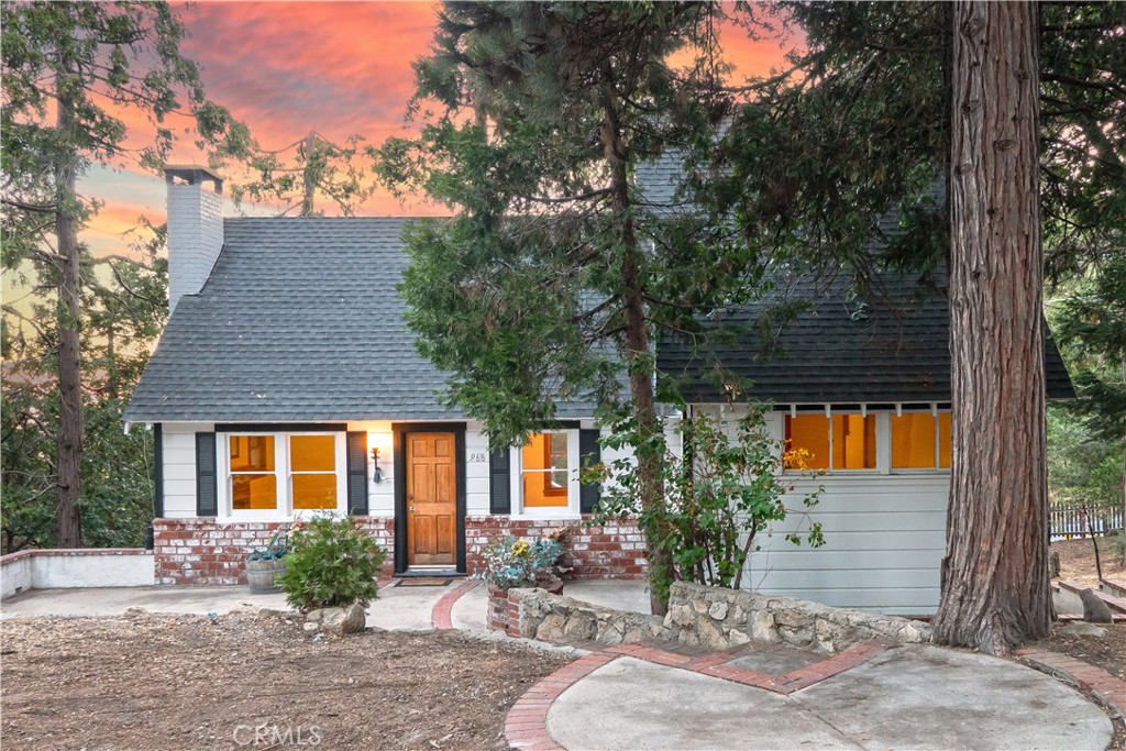 Just in time for Labor Day! Retreat to the mountains and enjoy this charming mountain cottage. Nestled in Twin Peaks, peace and serenity can be yours. This home is the perfect place to gather friends and family or to retreat on your own. Enjoy the changing of the seasons and the upcoming holidays in your own cozy mountain cottage. With enough space, updated features, outdoor living area, large backyard, and convenient location, this home offers great value! This opportunity is waiting for you.