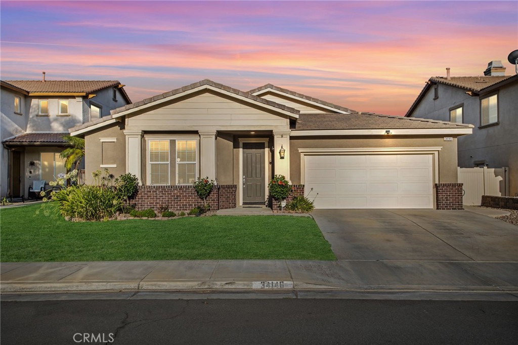 Welcome to 34146 San Sebastian Avenue, a beautifully designed single story home tucked away on a quiet cul de sac in Murrieta. With 4 bedrooms, 3.5 bathrooms, and 2,604 square feet of living space, this residence offers an open and inviting floor plan perfect for both everyday living and entertaining. At the front of the home, two bedrooms share a Jack and Jill bathroom, while on the opposite side, you’ll find a dual master setup with two bedrooms each featuring their own private bathrooms, creating an ideal arrangement for multigenerational living, guests, or a home office. The spacious interior includes formal living and dining areas that flow seamlessly into the family room where a cozy fireplace and built-in tech desk create the perfect gathering space. The gourmet kitchen showcases granite countertops, a large center island, and plenty of cabinetry, opening to the family room for easy connection while cooking or hosting. The primary suite is generously sized with a spa-like bathroom and walk-in closet, offering a true retreat. Step outside to the backyard where a covered alumawood patio and built-in fire pit set the stage for relaxing evenings or weekend get-togethers. A rare 3-car tandem garage offers extra room for vehicles, storage, or a workshop. With no HOA and a location close to top-rated schools, shopping, dining, freeway access, and Loma Linda University Medical Center, this home delivers a blend of comfort, style, and convenience in one of Murrieta’s most desirable neighborhoods.