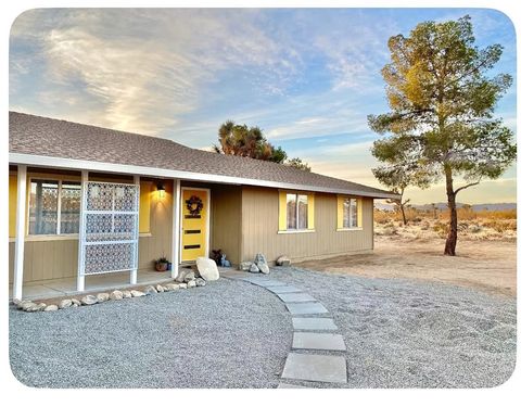 Photo of 3893 Manchester AVE, Yucca Valley, CA 92284 (MLS # JT26097277)