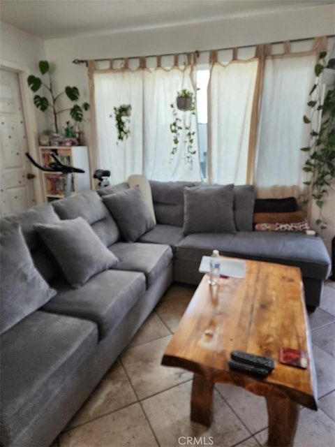 Photo of 319 E 98th Street, Inglewood, CA 90301 (MLS # SB26027612)