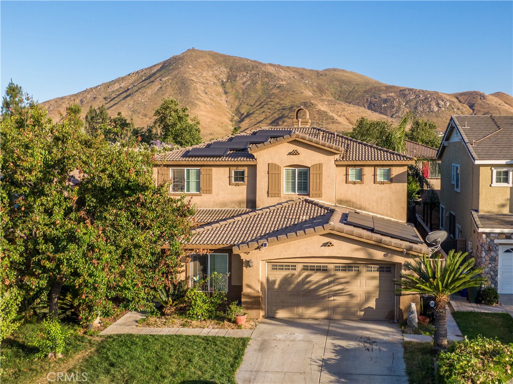 Welcome to the highly sought-out community of Sycamore Hills in South Fontana! This home is very spacious offering 4Bedrooms and a Bonus room that can be used as a 5th Bedroom, all upstairs. The upstairs is complete with a full restroom that offers double sinks and a closed off shower for those busy mornings when everyone needs to get ready at the same time. The Master bedroom is located upstairs as well and is very spacious, complete with an ensuite restroom and walk-in closet. Downstairs you will find Mother-In Law quarters (a bedroom and full restroom). A living room, den and spacious open concept kitchen. The home offers a custom Rock pool and jacuzzi that has a grotto/waterfall. The home also offers Tesla Solar Panels that have been Paid off! The location of this home is ideal! This is really the highlight of the property. The Elementary school is less than a quarter mile away giving you the ability to walk your kids to school. Sycamore Hills Park is located on the other side of the cul-de-sac, Stater Bros, Walgreens, The Home Depot, and even a 7/11 is walking distance from the home. Target is very close by as well, along with many different restaurants and shopping to choose from. Truly a great community to be a part of! What makes this community even better is that there is no HOA even though it looks and feels like it belongs to one. The home does need TLC but once this is done this can be the perfect place to call home!