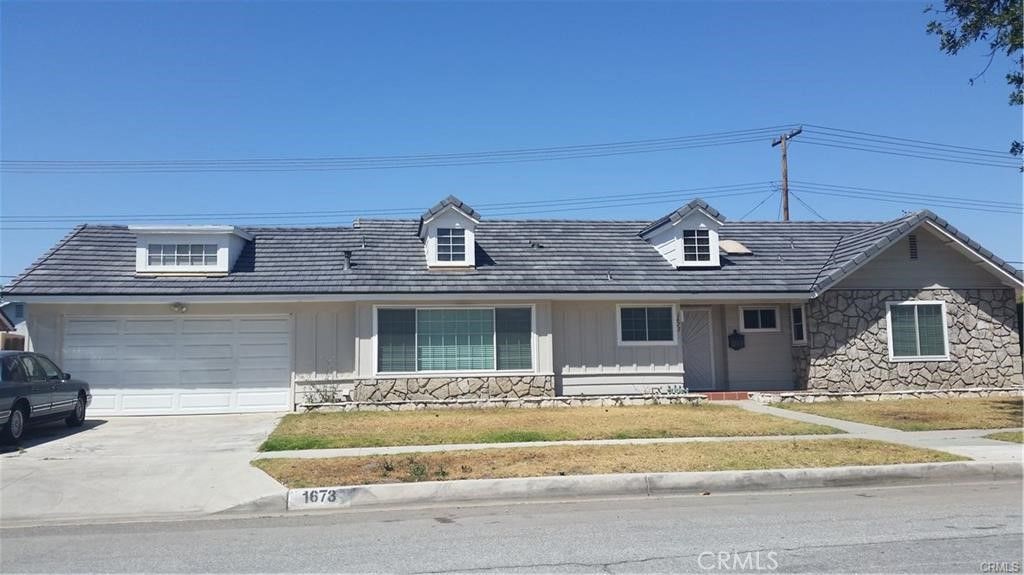 Photo of 1673 W Cris Ave, Anaheim, CA 92802 (MLS # PW25275735)