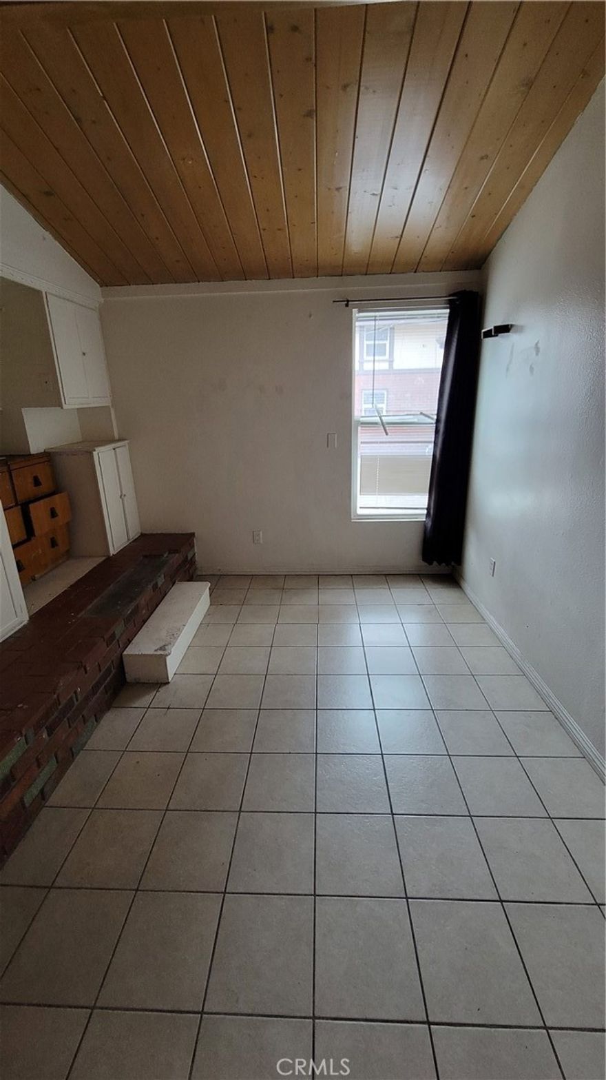 This is a small 2-bedroom 1 bathroom apartment located in the city of San Bernardino. It has a stove and a refrigerator.  It is a second level unit; there is an onsite coin laundry and plenty of street parking.