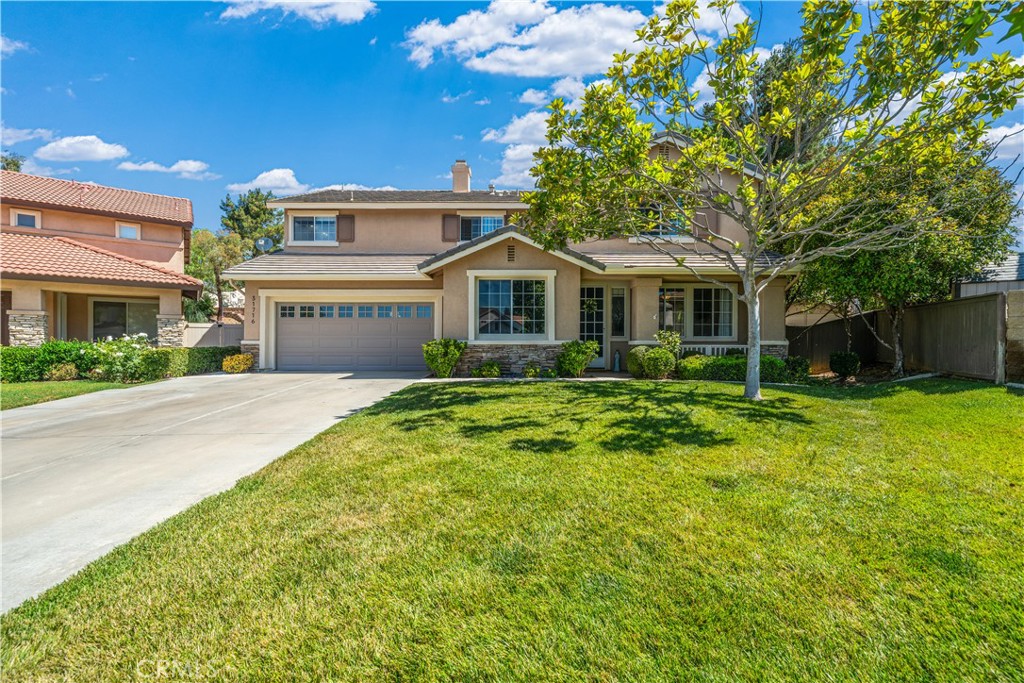 Nestled at the end of a quiet cul-de-sac, this spacious 5-bedroom, 3-bathroom home offers 2,867 sq. ft. of beautifully maintained living space on a generous 10,019 sq. ft. lot. Located in the highly sought-after Chardonnay Hills community, this home combines comfort, style, and resort-like amenities with the benefit of low taxes and a low HOA of just $165/month. Step inside and feel the inviting ambiance as you are welcomed by the gorgeous hardwood floors, crown molding, upgraded baseboards, fresh paint touch-ups, and modern light fixtures that elevate every room. The heart of the home is the large, bright, and airy chef’s kitchen, featuring granite countertops, crisp white upgraded cabinets with decorative knobs, new appliances, and an extended island. Ideal for multi-generational living or hosting guests, this layout includes a full bedroom and bathroom downstairs plus spacious upstairs bedrooms with walk-in closets. The tranquil master retreat is grand and features a custom closet organizer and a spacious master closet. You’ll also appreciate the extra-large laundry room and abundant cabinets and storage solutions throughout the house. Outdoor living is a dream in your private backyard, offering a tranquil escape. Sip your morning coffee to the sound of birds chirping and enjoy afternoon breezes from the mature trees. This pool-sized lot presents endless possibilities for crafting your ultimate outdoor sanctuary. The fenced side yard area is perfect for a dog run or storing your toys, and the custom wood patio cover extends your living space . Additional exterior features include rain gutters, a storage shed, an upgraded insulated garage door, and plenty of driveway parking with a tandem 3-car garage for all your vehicles. Recent major upgrades include a new AC unit, water heater, and kitchen appliances. Enjoy two resort-style community pool areas with jacuzzis and kiddie pools. The community also offers exclusive access to two gated parks, walking trails, numerous playgrounds, and a private sport complex featuring pickleball, tennis, basketball, baseball, and volleyball courts. Temecula has award-winning schools, beautiful wineries, and a wealth of community amenities that make this vibrant city truly special. This home offers the perfect blend of comfort, thoughtful upgrades, and a desirable community lifestyle. Centrally located — just minutes from local attractions and shopping. Don’t miss the opportunity to make this serene property yours!