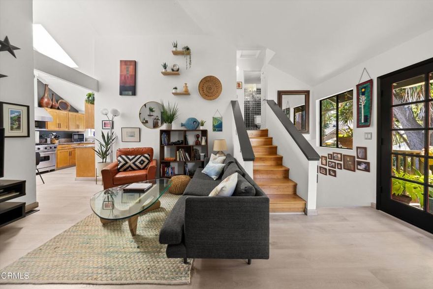 Picture stepping through the front door and feeling your shoulders drop as the world outside simply melts away. This isn't just another townhome--it's a three-story sanctuary tucked so far back from Salinas Street that the city's hum becomes a distant whisper. The moment you enter the main level, your eyes are drawn upward to soaring vaulted ceilings that transform this 1,090 square feet into something that breathes like a much larger home. Each of the three bedrooms claims its own floor, creating natural privacy that makes roommates feel like neighbors and families feel like they each have their own wing of a grand estate. But the real magic happens when you throw open those double French doors. Suddenly, the boundaries between inside and out dissolve, and your living space expandsinto a private garden oasis. The neighboring greenery conspires with your own yard to create a secret pocket of Santa Barbara where morning coffee feels like a meditation and evening gatherings stretch naturally into starlit conversations.Two parking spaces wait patiently for your return from beach days because East Beach is just a pleasant stroll away while downstairs, that jetted tub promises to wash away whatever the day brought your way.