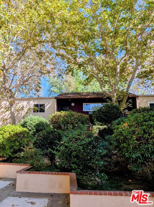 Discover your own private oasis at Tara Village. Enjoy being surrounded by beautiful tree-lined views and lush landscaping in a peaceful park like setting.                                                      This fully remodeled top-floor corner unit offers the perfect blend of privacy, natural light and contemporary design. With 3 spacious bedrooms and 2 full bathrooms - this 1050 SF condominium has been updated with modern and stylish finishes and sleek new appliances. The primary bedroom features a full en-suite bathroom, while the two additional bedrooms provide both space and privacy for family, guests or a home office.                                         Other highlights include in-unit laundry hookups and two carport parking spaces close to the unit. This top floor unit is located in the best spot in the entire complex due to  its close proximity to the front gate and pool area. Tara Village also offers resort-style amenities including a heated swimming pool, soothing spa, fitness center, BBQ/picnic areas and a playground  all within a secure gated community.                                                                                                                                  This move-in-ready home delivers the best of Tara Village living  space, style, and location all in one. Schedule your private showing today and experience the charm of this exceptional home in person!