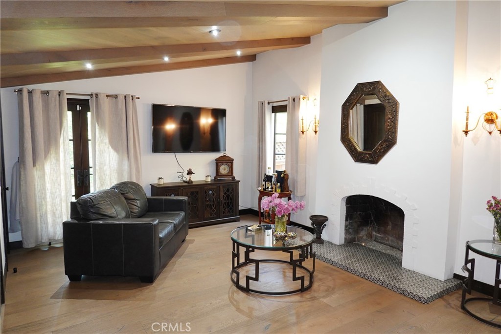 Beautifully updated Spanish-style gem PLUS an ADU in Glendale’s desirable Rancho District! This lovely home is ready for its next chapter, offering charm, fantastic curb appeal, functionality, and thoughtful upgrades throughout. MOVE IN READY and PRICED TO SELL!
The main house features recessed lighting, wood beams, gorgeous Spanish accents, distressed flooring, a European-inspired kitchen with tile back-splash, quartz counter-tops, premium stainless steel Bosch and Miele appliances, washer and dryer hookups, plus a cozy breakfast nook, ideal for your morning coffee and daily meals. The bathrooms have been tastefully remodeled with modern walk-in glass showers, stylish tile-work, and clean, contemporary designer finishes. The third bedroom at the back of the house is vacant and easy for you to visualize your home office, gym, arts and crafts room, or play area for kids, giving you flexibility to suit your lifestyle.
In addition to the main house, you’ll find a fully finished ADU, complete with its own kitchen and bathroom. This ADU is perfect for guests, a home office, or for extended family members who need their own space and privacy. Plenty of parking for multiple cars in the driveway, under the carport, and street parking as well.
Every inch of this property reflects pride of ownership and attention to detail. Minutes from major studios, freeway access, Griffith Park, The Americana at Brand, Glendale Galleria, and other everyday conveniences, this property has everything you're looking for! Come see it, feel it, and fall in love!