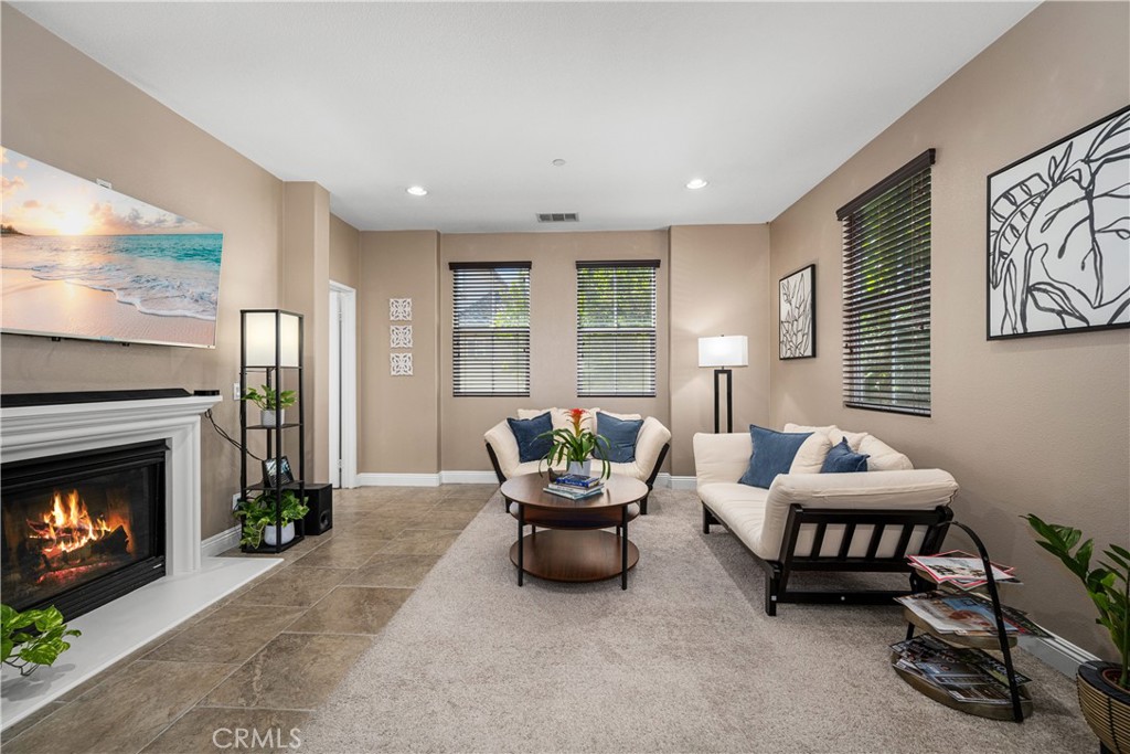 Modern luxury living starts here at Serafina gated community. This immaculate end-unit condo offers the perfect blend of style, space, and convenience—ideal for a cozy yet elevated lifestyle. It features dual primary suites one being downstairs and another upstairs with 2.5 baths which offers ideal privacy and versatility. The bright open-concept layout, extra natural light and breezes, and plenty of room allows you to relax or entertain family and guests. With a prime Eastvale location, top rated award-winning schools, and resort-style community amenities, this home makes it a truly exceptional place to call home. Move-in ready and perfectly maintained, this home is ready for a new homeowner.