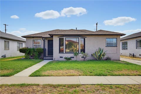 Photo of 904 N Evers Avenue, Compton, CA 90220 (MLS # SB26158812)