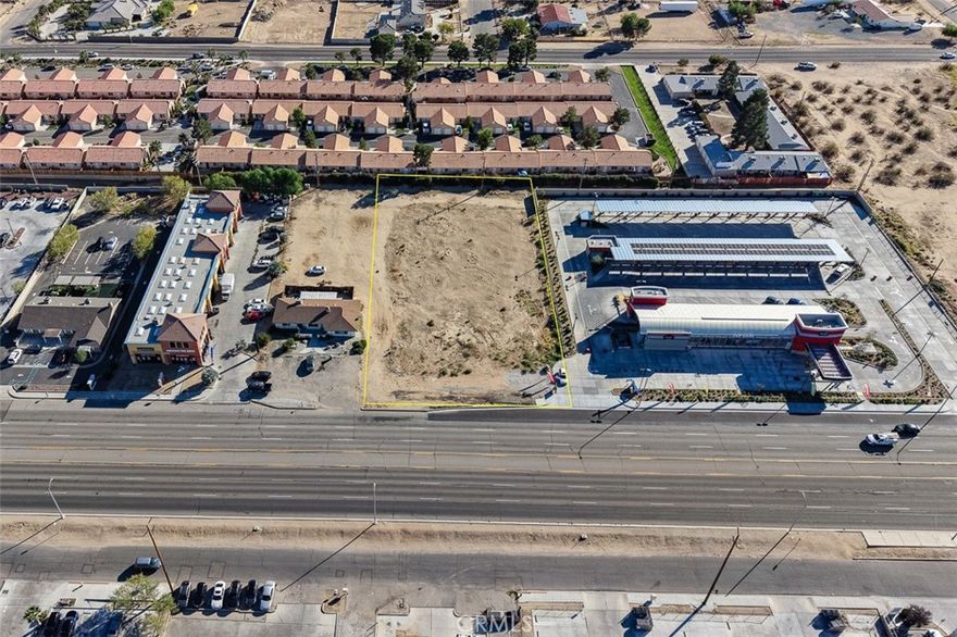 Located in a high-traffic, well-established commercial corridor in Hesperia, this development site offers immediate exposure and strong vehicle counts — over 50,000 cars per day along Bear Valley Road. Adjacent to a brand new express car wash, the parcel benefits from complementary traffic generation and built-in visibility. Prior plans and permits were obtained for a 10,432 sq ft shopping center with 9,572 sq. feet of rentable space.  Those plans and entitlements have expired presenting a rare “greenfield” opportunity for a modern commercial center conceived to today’s market. Whether you envision a vibrant retail/office hub or full-scale mixed-use development, this site is ready for a refined design and entitlement process in one of the High Desert’s most accessible locations.