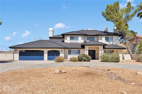 Photo of 16731 Iwa Road, Apple Valley, CA 92307 (MLS # HD26152273)