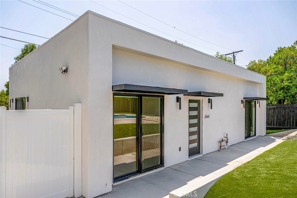 Welcome to your dream New Construction ADU! Tucked away in one of Granada Hills’ most desirable neighborhoods, this newly built 3-bedroom, 2-bath accessory dwelling unit offers modern comfort and privacy. Step inside to soaring high ceilings and an open-concept layout that fills the space with natural light. The sleek, gorgeous kitchen features quartz countertops, soft-close cabinetry, and stainless steel appliances, The primary suite has it's own beautifully appointed ensuite bathroom. Enjoy indoor-outdoor living with your own private large patio—ideal for morning coffee, weekend barbecues, or relaxing. You will love the fully PAID-OFF SOLAR system, helping you save on utilities, dual-pane windows, modern curtains, recessed lighting, in-unit laundry hookups! gated side entrance provides privacy, additionally enjoy access to a shared pool just steps away a perfect bonus for warm California days. Conveniently located near top-rated schools, shopping, dining, parks, and easy freeway access. This is a must see!