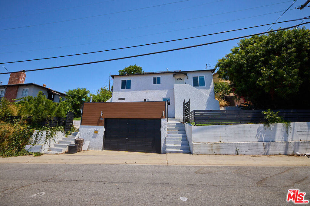 Wonderfully located artistic open floor design living space in the heart of City Terrace is ready to go. This lovely property has been fully remodeled with new double-paned windows and laminate flooring. Galley kitchen and bathroom have been completely remodeled, fresh interior & exterior paint, new front fence, landscaping, and new electrical system. Great private entertaining area. Washer/dryer and EV charging in garage, solar panels, smart home features MyQ smart garage. Views of DTLA, Hollywood Sign, Griffith Observatory and Dodger Stadium. Located within a few minutes of Downtown Los Angeles, Cal State and USC Keck School of Medicine. Convenient to the 10 Freeway.