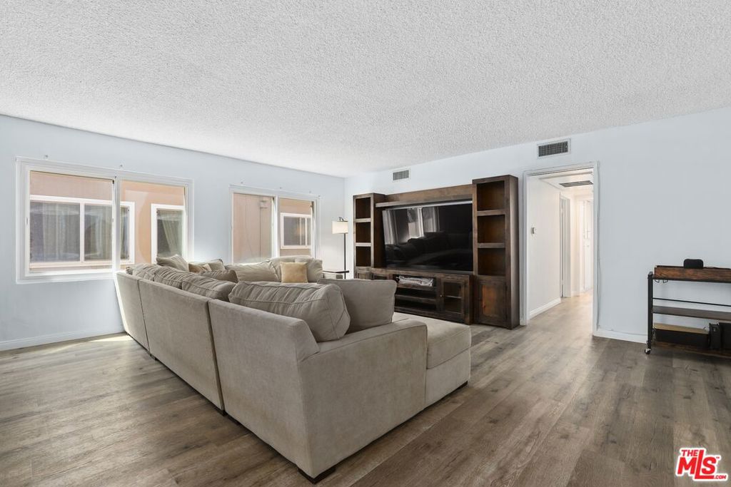 Welcome to this well-maintained and spacious condo, ideally located on a quiet street in the heart of booming Inglewood. Just minutes from iconic venues like SoFi Stadium, the Intuit Dome, and the YouTube Theater, this home puts world-class entertainment right at your doorstep.Enjoy unbeatable convenience with LAX, the beach, and Culver City all within a 15-minute drivemaking this one of the most desirable and rapidly appreciating neighborhoods in Los Angeles.Step inside to an open layout designed for modern living, featuring a large primary suite, two private balconies, and abundant closet space. The unit includes stainless steel appliances, in-unit washer and dryer, and keyless smart lock entry for ultimate ease and security.Additional highlights include two separate gated parking spaces and most furniture negotiable with the right offer, making this an effortless, move-in-ready opportunity.
