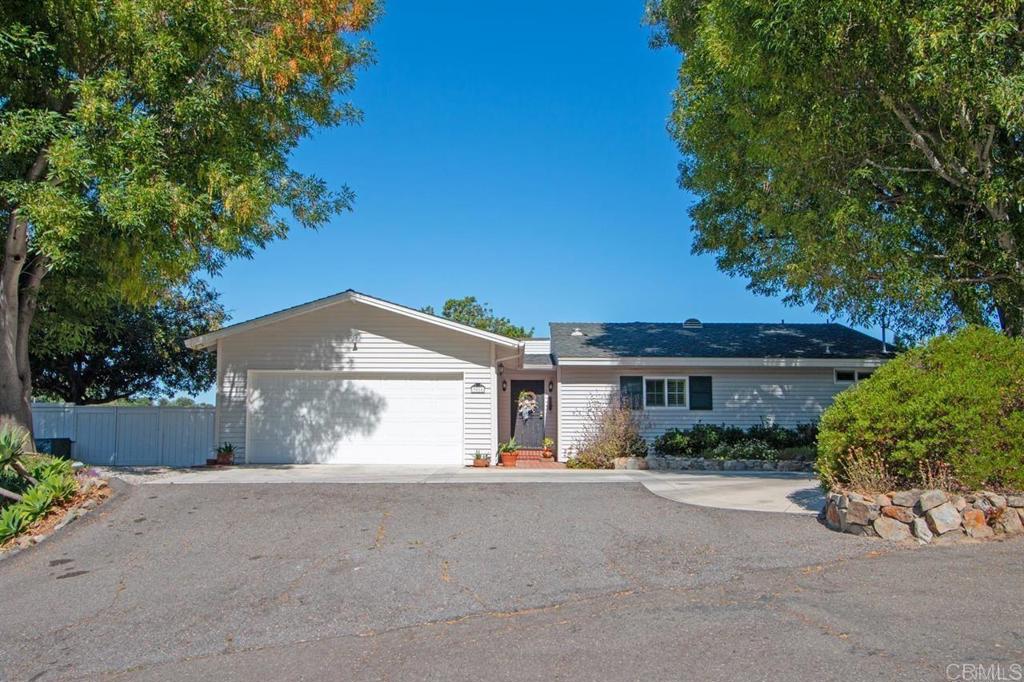Your own private oasis in the hills of Fallbrook. Enjoy the views all day long from the south facing deck above your own private 188 Olive tree grove. Inside you will find a brand new Kitchen along with all new appliances. The interior has a fresh new paint job throughout the house and a remodeled Primary bathroom. In addition there are 4 new minisplit AC/Heat modules throughout the home to keep you comfortable no matter what the weather is outside. The Front room opens to the backyard forever views over the newly painted deck. The home is fenced in so your pets can run freely around the home and the Solar panels are paid for so your electric bill will be minimal. This home has two larger bedrooms that both look out on the middle courtyard which brings in a lovely amount of sunlight to the rooms. The home is a peaceful and serene escape from the busy city life but only 8 minutes away from I-15 and civilization. Call for a private showing to experience all that this amazing home has to offer!