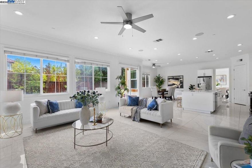 Resort-Like Executive Home with upgrades in Dublin Ranch Golf Course  Step into nearly 4,900 sq ft of designer living in this 6-bed, 4.5-bath move-in ready executive home on a 9,300 sq ft corner lot, fully renovated in 2022 with $350K+ in upgrades. A bright white interior with cool white porcelain tile floors offers elegance and keeps the home cool during hot Tri-Valley summers.  The gourmet kitchen features stainless steel appliances, an expansive island, modern cabinetry, and opens seamlessly to sunlit living spaces. A full guest suite downstairs, custom closet systems, recessed lighting, ceiling fans in every room offer comfort, functionality, while a beautiful low-maintenance backyard is ideal for play or entertaining.  Enjoy two separate fitness spaces, an upstairs loft & garage gym both with mirrored walls, vinyl flooring and storage cabinets creates unmatched wellness space, perfect for workouts, yoga, or dance.  Situated in the sought-after Dublin Ranch Golf Course community steps away from HOA amenities: pool, tennis courts, and a golf clubhouse. Just minutes from top-rated schools, Fallon Sports Park, 580/BART, and shopping at San Francisco Premium Outlets.  Why buy new when you can move into a fully upgraded home across from HOA amenities, walkable community living.