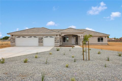Photo of 12584 Mesquite Road, Apple Valley, CA 92308 (MLS # HD25195131)