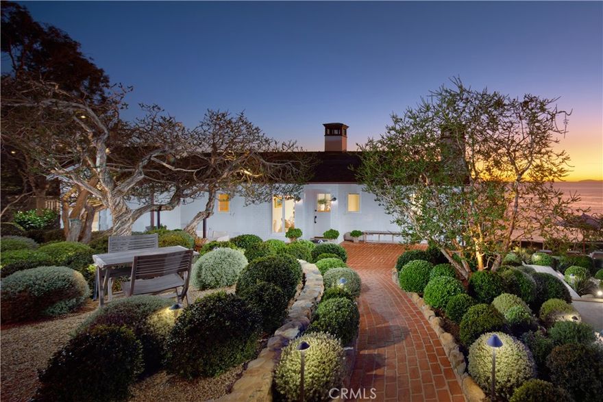 A truly rare offering: 6 Rockledge presents a once-in-a-generation opportunity to lease an extraordinary oceanfront home in one of Laguna Beach’s most iconic coastal settings. Positioned on two lots with 160 feet of breathtaking ocean frontage, this Colonial Revival estate is steeped in California history and reimagined for refined modern living.



Set along the picturesque Rockledge coastline—made famous by California’s original Plein Air painters—this property captures the spirit of “Old California” with timeless architectural details, romantic charm, and panoramic views of the Pacific. Painstakingly restored with preservation and integrity in mind, every inch of this home reflects thoughtful craftsmanship and luxurious design.



The estate includes a main cottage  and a detached casita, each filled with natural light and nautical-inspired elegance. Original painted oak floors, brick fireplaces, Waterworks plumbing fixtures, solid brass lighting, and bespoke cabinetry create a warm, elevated atmosphere. Every room is artfully furnished and adorned with curated California artwork, striking a perfect balance between classic coastal and contemporary luxury.



Outdoors, stone and brick pathways meander through lush, mature gardens filled with citrus trees, succulents, eucalyptus, and perennials. Multiple seating areas—some intimate, some expansive—offer ideal settings for entertaining or peaceful solitude. A jacuzzi, bocce ball court, dining terrace, and ocean-facing firepits create an unparalleled environment for relaxation and rejuvenation.



6 Rockledge is more than a home—it’s a lifestyle. A sanctuary where the beauty of nature meets timeless style and where every detail tells a story. Available for lease, this is your chance to experience the magic of Laguna Beach from a place that is both deeply rooted in history and uniquely crafted for the present.