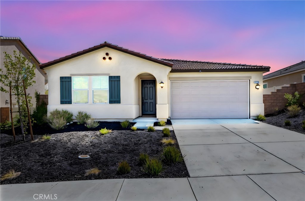 In the premier new neighborhood of Crimson Hills this single level stunner shows like an absolute model and features a 1/4-acre usable lot! Thoughtfully enhanced with designer finishes by a professional designer, this home combines style and functionality, offering a move-in ready space with custom touches throughout. Crimson Hills puts you right where convenience meets adventure. Walk the kids to Earl Warren Elementary, spend weekends cheering at Storm Stadium, or enjoy family outings at nearby parks. Shopping runs are a breeze with Costco, Lowe’s, and Lake Elsinore Marketplace just minutes away. Outdoor lovers will appreciate easy access to hiking trails, Rosetta Canyon Sports Park, and Lake Elsinore—perfect for boating, fishing, and fun on the water. Plus, with quick connections to I-15 and Hwy. 74, commuting and weekend getaways are simple. A custom doorway from the primary closet provides direct access to a guest room—an ideal setup for a nursery, home office, or private retreat! The spacious ¼-acre backyard is a blank canvas, ready for you to create your dream outdoor retreat—whether that’s a pool, garden, or entertainer’s paradise and one of the largest in the community!