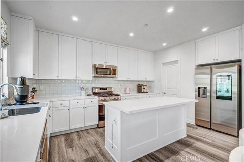 Photo of 747 Spring Garden Gdn, Irvine, CA 92618 (MLS # OC25119809) Photo of 747 Spring Garden Gdn, Irvine, CA 92618 (MLS # OC25119809)