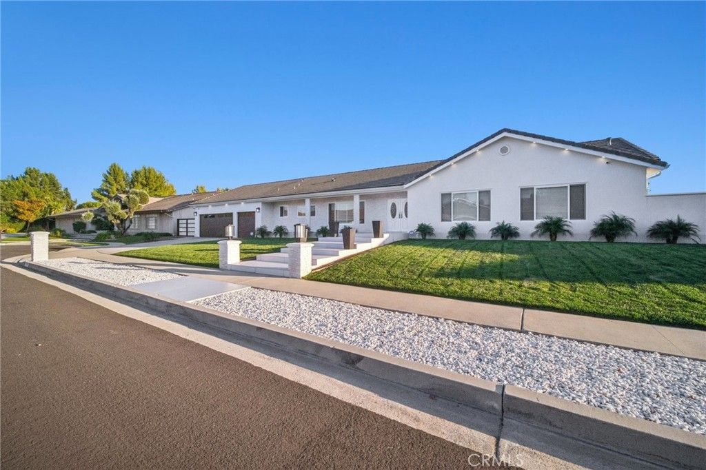 Photo of 17158 Citronia Street, Northridge, CA 91325 (MLS # SR25237052)
