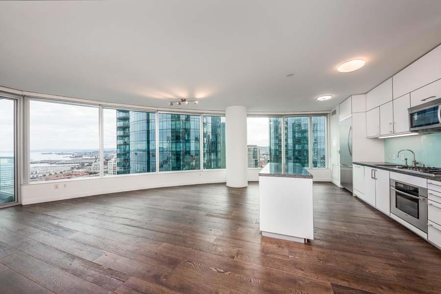 Enjoy urban living in this signature Infinity 2BR/2BA home with an office/den nook and balcony. Each room has beautiful water and city views. This spacious, 32nd floor home is finished with hardwood floors, Studio Becker cabinetry, Bosch range, Thermador Refrigerator, and custom window treatments. One secure parking space included. Building amenities include a 5,000 sf Fitness Center, Indoor Lap Pool, Sauna, Movie Theater, Business Center & Conference Rooms, Club Lounge with a full Kitchen & Wet Bar and 24/7 Security & Concierge. Walk to the waterfront Embarcadero, Farmers Market, Union Square and the Financial District. EZ access to the Bay Bridge, 280 and 101. Not available for move in until August 7 /Available for showings starting 8/1.