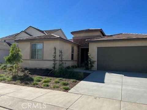 Photo of 5820 Quicksilver Way, Banning, CA 92220 (MLS # TR26071335)