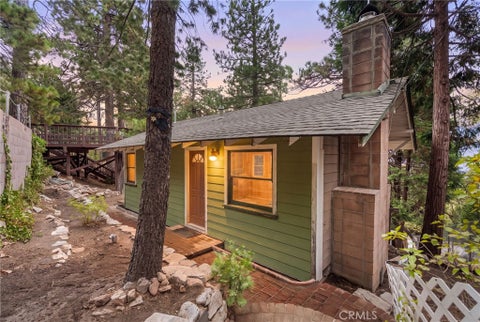 Photo of 31669 Panorama DR, Running Springs, CA 92382 (MLS # IV26226648)