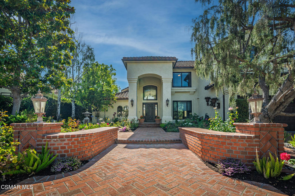 Welcome to 2612 Yellowwood Drive, nestled in the prestigious Three Springs Community of Westlake Village. This beautiful residence is ideally situated on a quiet cul-de-sac offering the epitome of luxury living with a serene ambiance that invites you to unwind. From the moment you step inside the grand foyer, you'll discover 4,258 sq ft of an elegant and thoughtful layout offering 5 bedrooms and 5 bathrooms. Entertain with ease in the spacious living spaces, including formal living and dining areas, and a cozy family room with a welcoming fireplace that is open to the chef's kitchen. Enjoy the convenience of a downstairs en-suite bedroom and a separate office, providing flexibility for your lifestyle needs. Upstairs, retreat to your peaceful Primary wing overlooking the backyard oasis, complete with a fireplace and an ensuite bathroom, offering a jacuzzi tub, double vanity and a huge walk-in closet. Three additional bedrooms, one with its own en-suite bathroom are also located upstairs. Unwind in the tranquility of the backyard, featuring a sparkling pool, perfect for lounging and soaking up the sun, or dining al fresco under the stars. Embrace year-round relaxation and make cherished memories
