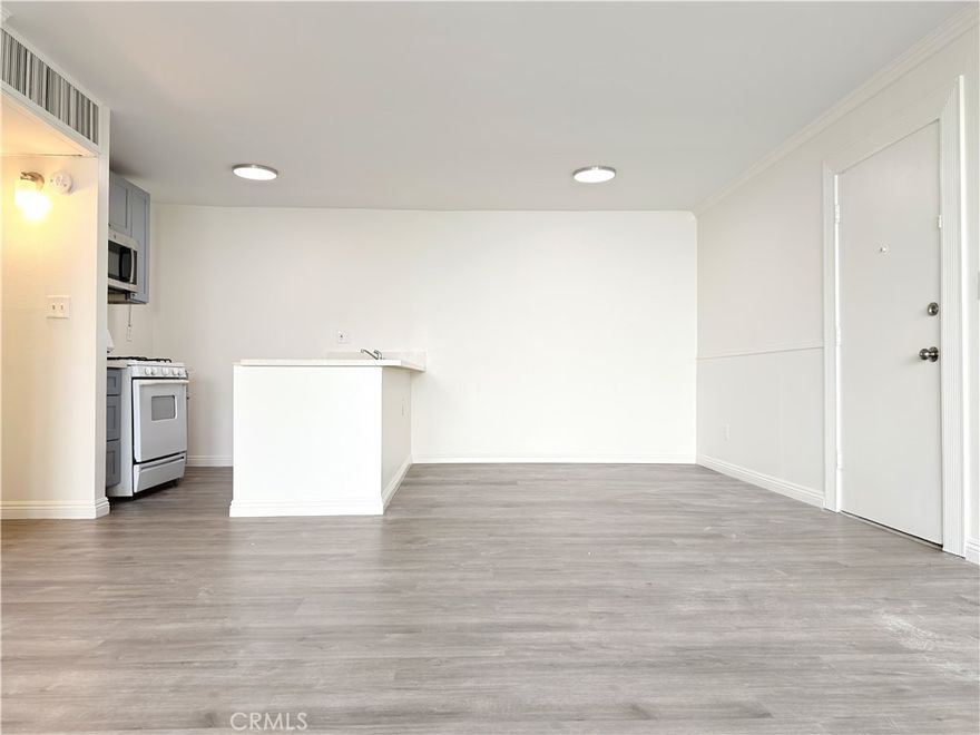 Welcome to this beautifully remodeled 2-bedroom, 2-bathroom condo located at 8601 International Avenue, Unit 179, in Canoga Park. Offering 883 square feet of comfortable living space, this first-level unit combines modern upgrades with convenience and style.



Step inside to discover new flooring throughout, recessed lighting, upgraded bathrooms, and a modern kitchen with quartz countertops. The open-concept layout creates a bright and inviting atmosphere, perfect for relaxing or entertaining guests.



This home includes a reserved HOA parking space for your convenience. Enjoy the benefits of living in a secure, gated community featuring amenities such as a pool, spa, and on-site laundry facilities.



Located just minutes from Warner Center, Westfield Topanga Mall, and major freeways including the 27, 118, and 101, this condo offers the perfect combination of comfort, accessibility, and modern living.