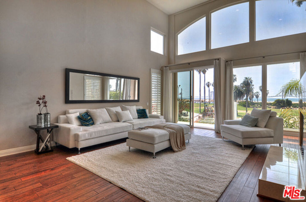 Perfect and Inviting, this panoramic ocean, coastline and Catalina view townhome creates its own oasis. Located in the heart of the exclusive beach resort environment at Del Rey Park and Toes Beach, this townhome features pampering amenities to delight the most discerning client. The 3 bedroom. 3.5 bath 2500 square foot home boasts an easily accessible rooftop deck, oversized garage, updated kitchen appliances, hardwood floors and a separate loft/office/bonus room. recessed lighting, lots of storage, cabinet and counter space, laundry room, extra storage and more! This idyllic beach location has park with a kiddie playground across the street , is a short walk to downtown Playa, the Beach and and the bike path. It is conveniently close to all freeways, LAX and is the hub of the Silicon Beach communities. Just a bike ride or walk to Marina Del Rey, El Segundo and Manhattan Beach, and a short drive to Venice, Culver City and South Bay Beaches. But there is a quiet serenity here. Playa Del Rey Lagoon's attraction for so many is the separation it offers from the noise, pollution and chaos of the city. It invites you to participate in everything a beach community offers, but it allows you to just be an observer and enjoy the ambiance of a unique lifestyle.