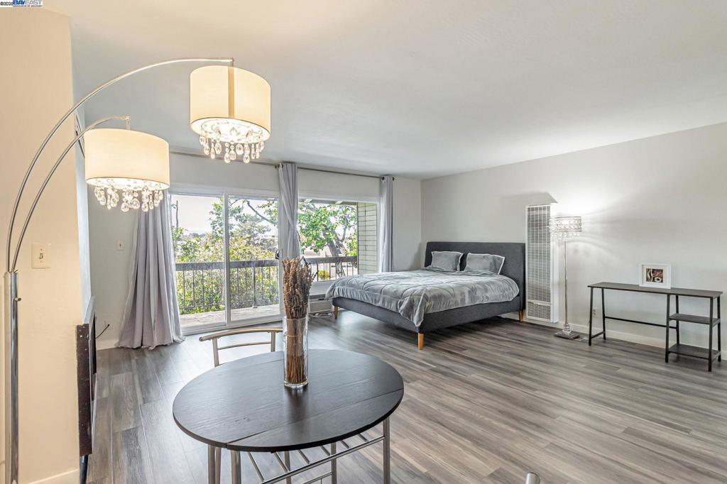 Charming & Bright Studio in Prime San Mateo Location – Casa Laguna II! Welcome to this well-maintained second-floor studio, bathed in natural light from expansive floor-to-ceiling windows! The open-concept layout features a sleek kitchen with Granite countertops and a handy pass-through to the dining area. Step out from the living room onto your private balcony—perfect for relaxing with a morning coffee or evening breeze. Easy access to incredible community amenities, including elevator access, swimming pools, a spa, clubhouse, gym, playground, barbecue area, tennis/basketball courts, laundry facilities on each floor, ample guest parking, and one assigned garage parking space #54. Ideally located near the scenic lagoon, Bridgepointe Shopping Center, Home Depot, Costco, Gilead, Mariners Point Golf Course, and major commute routes (Highway 101 & 92). Low HOA fee covers water & garbage! An unbeatable opportunity for budget-savvy buyers ready to own in San Mateo! Don’t miss out—schedule a tour today!