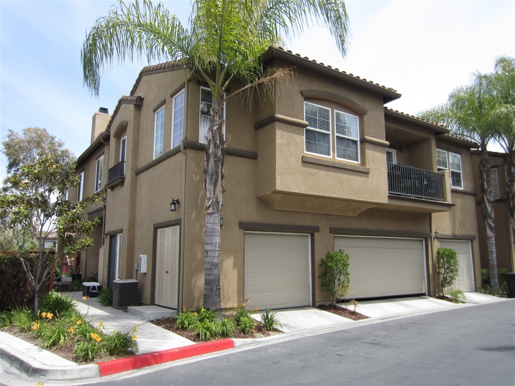 Don't miss out on this end unit townhome which offers 2 bedrooms, 2 bathrooms, an att. 1 car garage, assigned parking spot, and is located in the very desirable Edgewater Complex. This unit has an open, airy, and spacious feel with tile floors in the entry and in the kitchen which also has beautiful cabinets, tile counters, a stainless steel refrigerator, dishwasher, and microwave, and a balcony off of the dining room w/ room for a BBQ. Relax by the pool and enjoy the resort type feel of the complex. Neighborhoods: Vista Pacifica Equipment: Dryer,Garage Door Opener, Range/Oven, Washer Other Fees: 0 Sewer: Sewer Connected Topography: LL